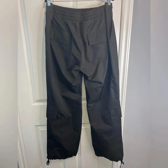 ♠️”EPTM.” NWT Black Cargo Pants w/ Drawstring & Multiple Pockets Size 2XL/38♠️ - Picture 3 of 17